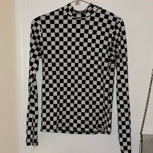 Checkered turtleneck. Size S.